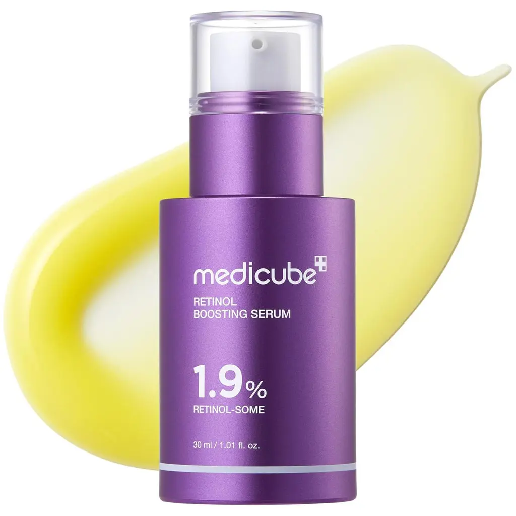 Medicube-Retinol-NMN-Boosting-Serum-30ml.webp Medicube Retinol NMN Boosting Serum bottle on display