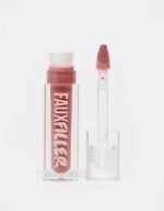 Huda Beauty Extra Shine Lip Gloss tube displayed cleanly on a surface